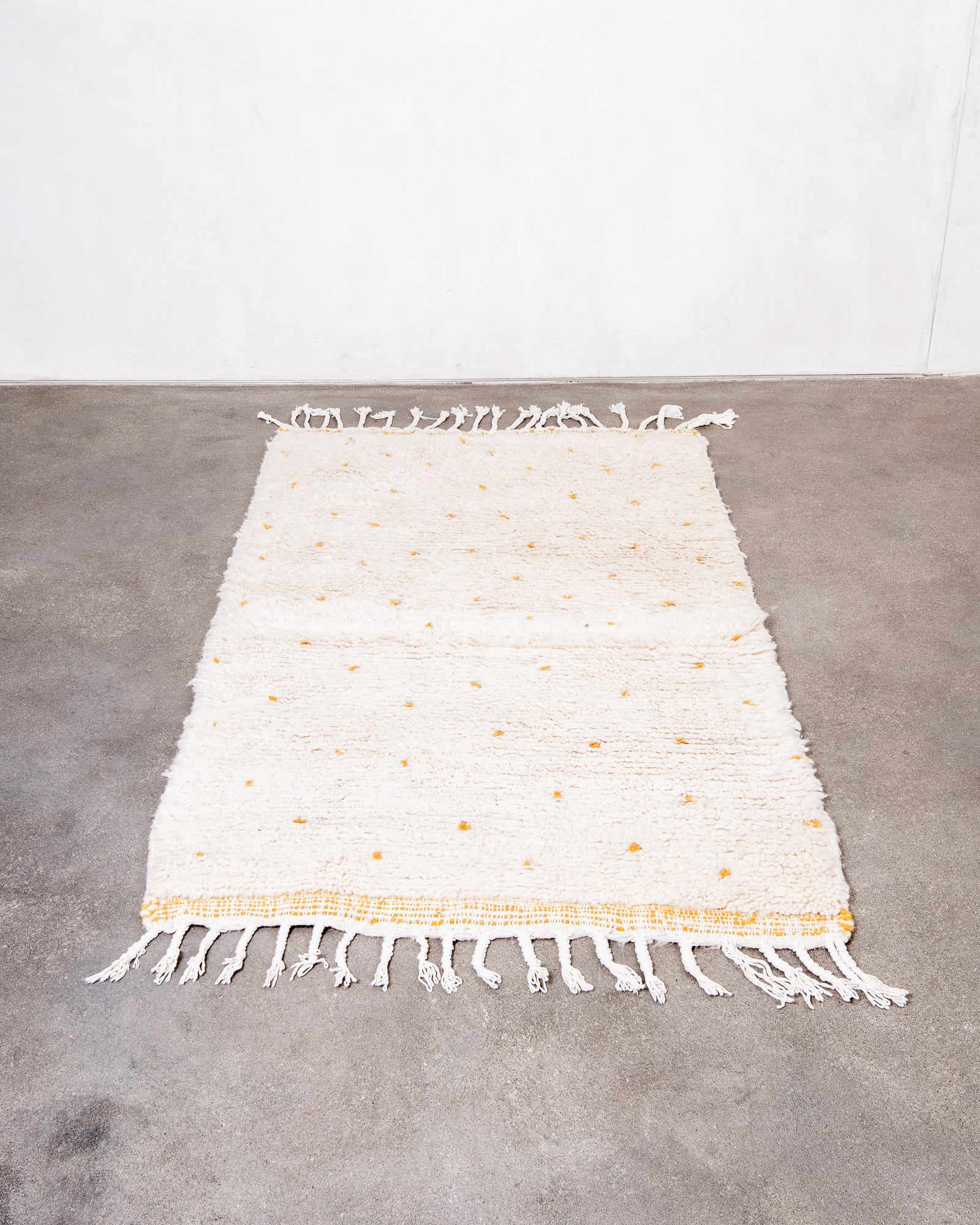 Modern, designer, handcrafted Berber rug from Morocco. Beniourain carpet with beautiful colours and patterns and fluffy wool texture.